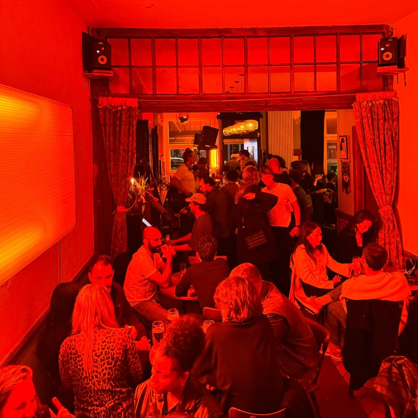 Honey Lou Bar Berlin — packed room in red light